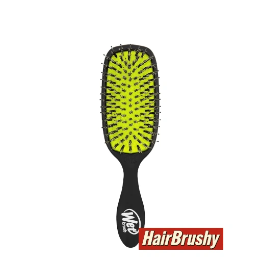 A black Wet Brush Shine Enhancer with a bright yellow cushion and black bristles is displayed vertically against a white background. The HairBrushy logo in red and white appears in the bottom-right corner.